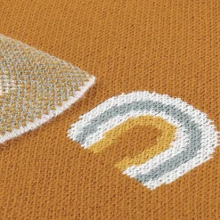 Couvertures*Noukies Tiga, Stegi & Ops Couverture tricot en jacquard BIO 75 x 100 cm de Ocre